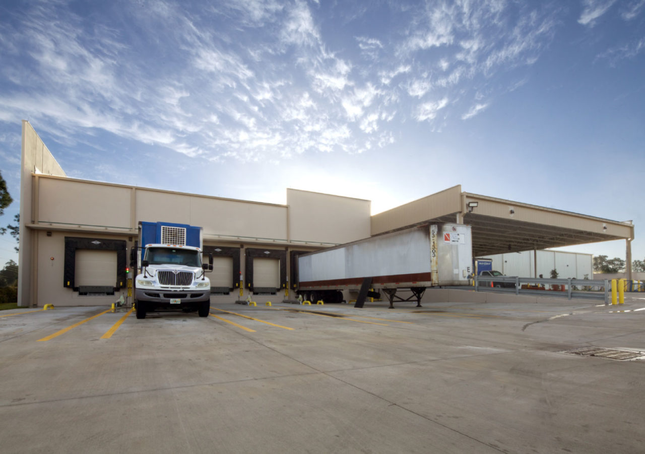 Dock Positions with Trucks at Coastal Beverage Distribution Facility Built by ARCO Construction in Naples