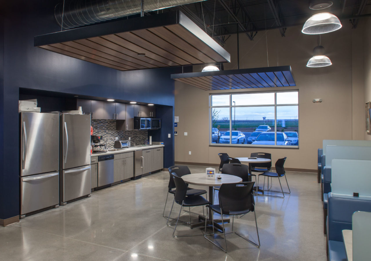 Break Room with Kitchen and Booths at High Country Beverage Distributing Center Built by ARCO Construction