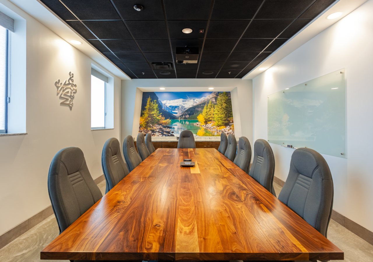 Wood Table with Art in Conference Room at Yellow Frog Graphics Facility Built by ARCO Construction