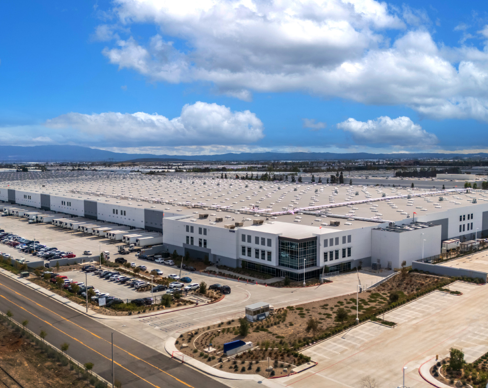 Aerial view showing a confidential client's front entrance and loading docks of their large 1.4 million SF Cold Storage Renovation in Rancho Cucamonga, CA
