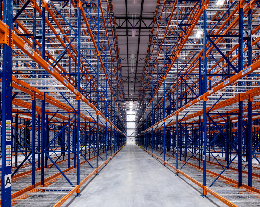 Empty racking on either side of the photo for RealCold's Cold Storage Facility in Lakeland, FL