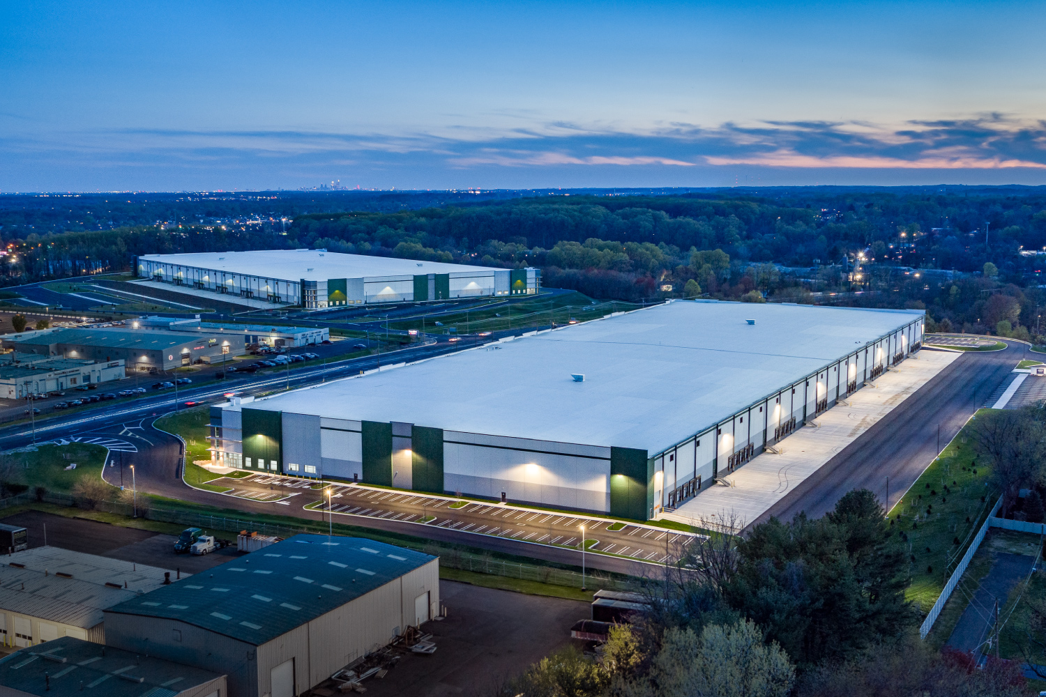sunset with an aerial view of two warehouses built by ARCO for Foxfield
