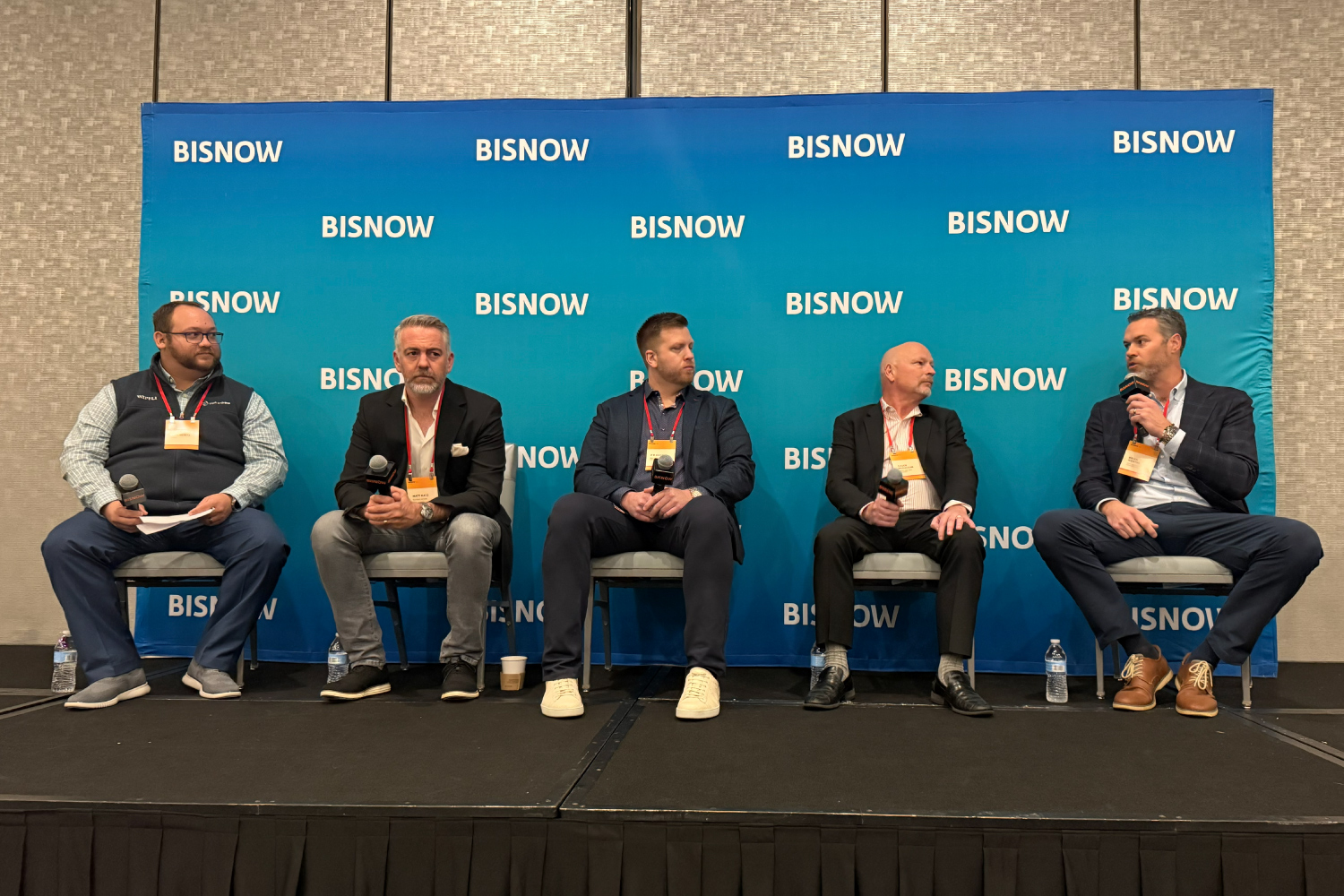 photo of a panel speaking at Bisnow's Orange County Construction & Development Summit