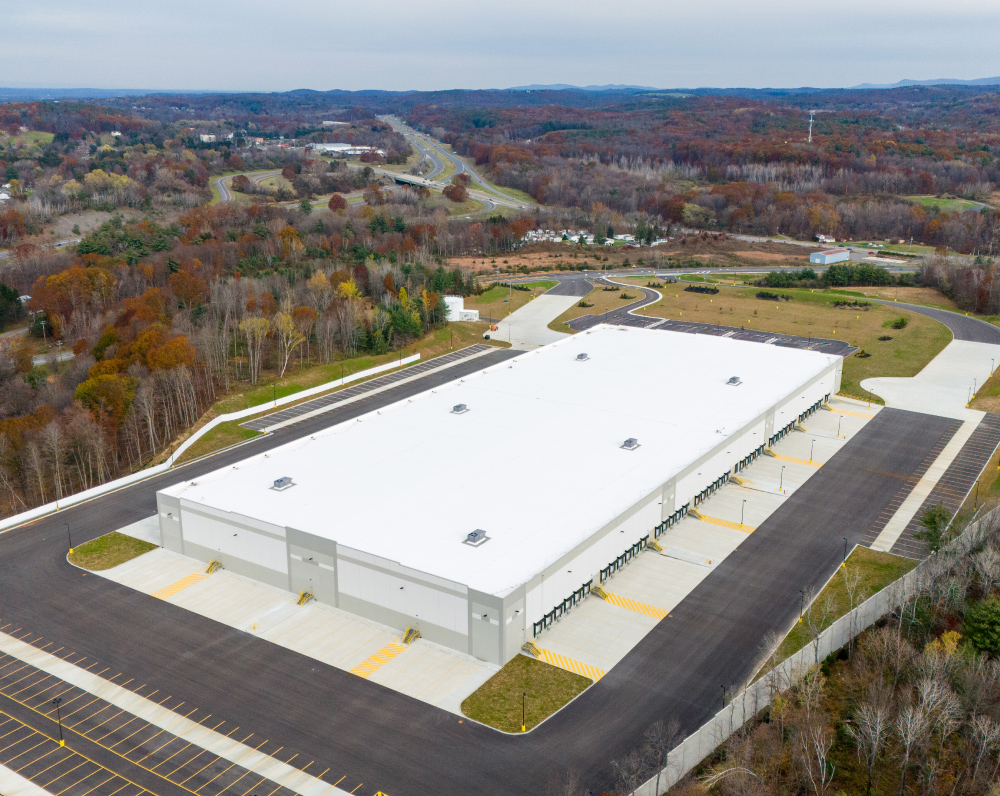 aerial image of cross-dock sortation center and distribution facility in schodack new york for amazon