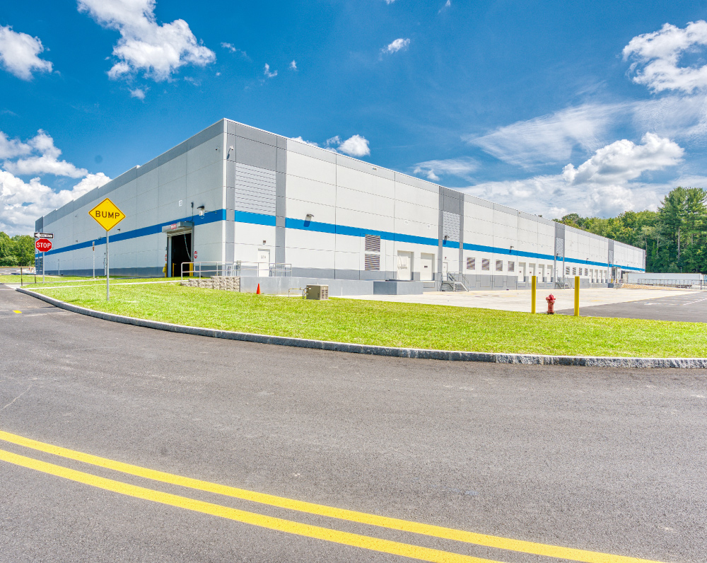 exterior image of the amazon last mile delivery station in littleton massachusetts