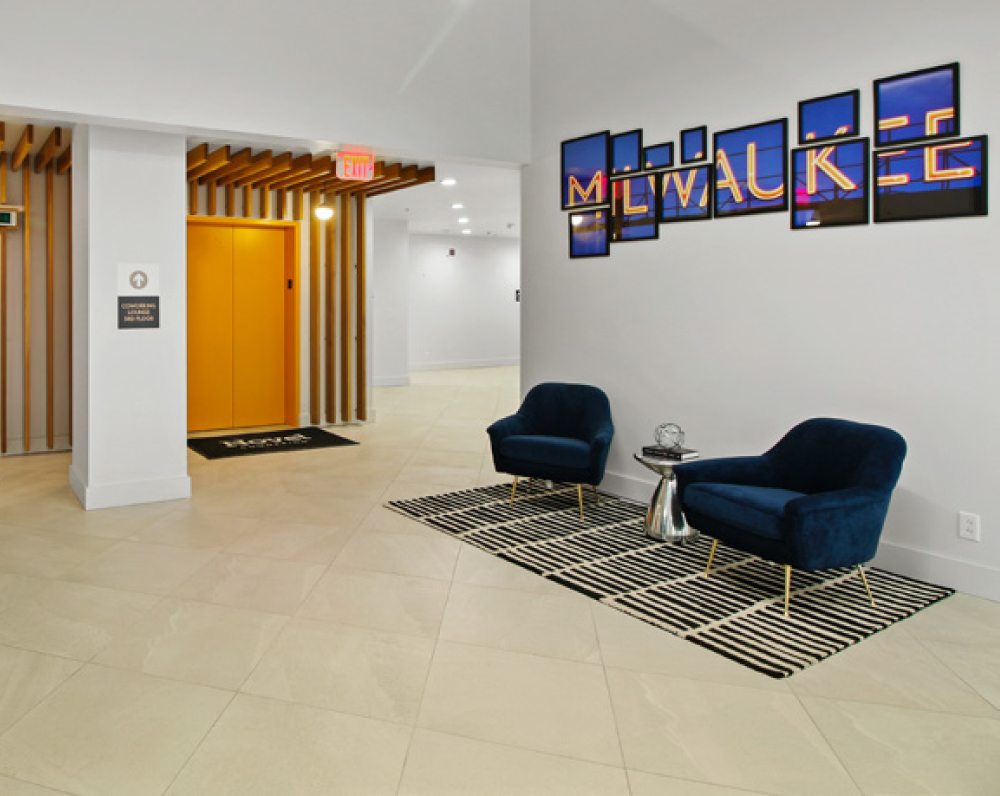 elevator waiting area in the expansive coworking milwaukee office building