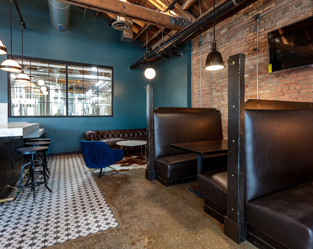 seating area in the midwest coast brewing company taproom renovation in chicago illinois