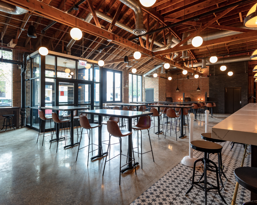 dining space inside the midwest coast brewing company taproom in chicago illinois