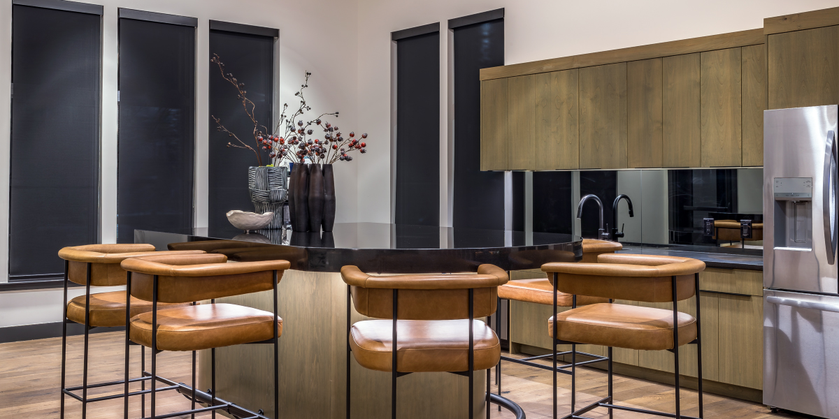 kitchen and dining area within a unit of the reserves at eagle point apartment complex in aurora colorado