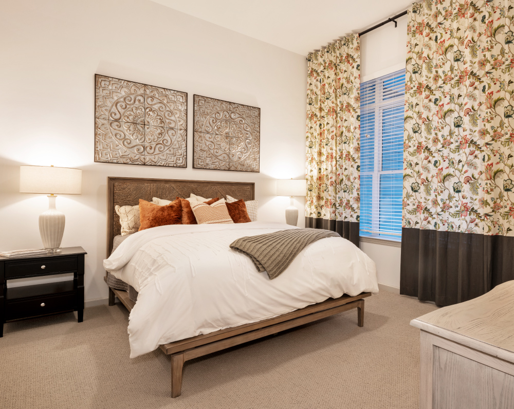 bedroom of a unit within The atria independent senior living community in cary north carolina