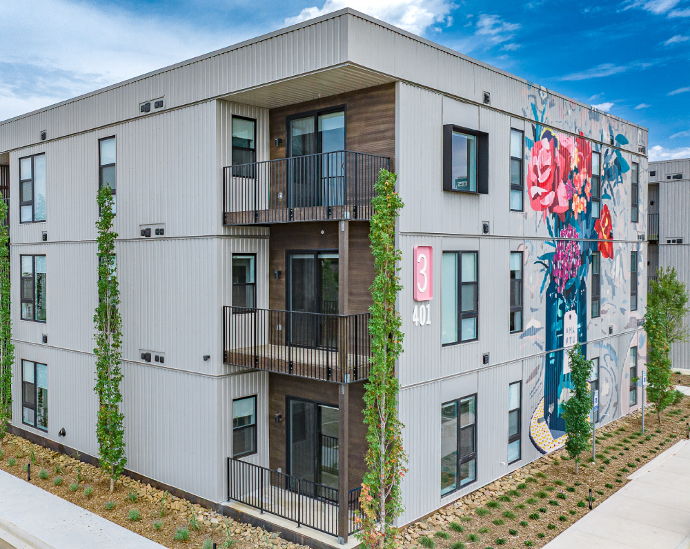 exterior image of a first street flats apartment building in rodgers arkansas