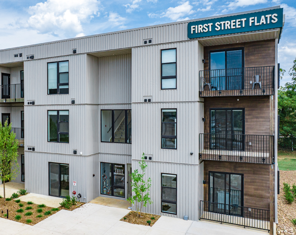 exterior of the first street flats apartment building in rodgers arkansas