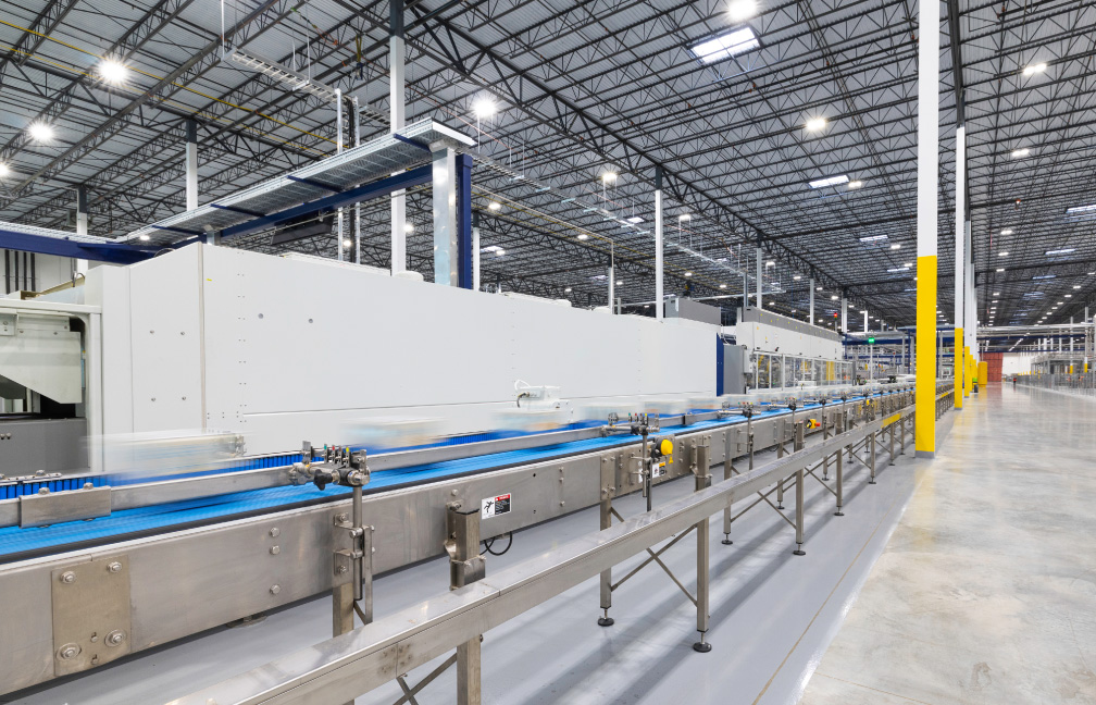active production line inside the drinkpak beverage manufacturing facility in dallas fort-worth