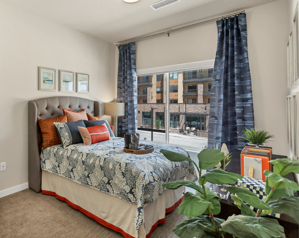 bedroom of a unit in The Ovation by avamere at sienna hills Continuing Care Retirement Community in washington city utah